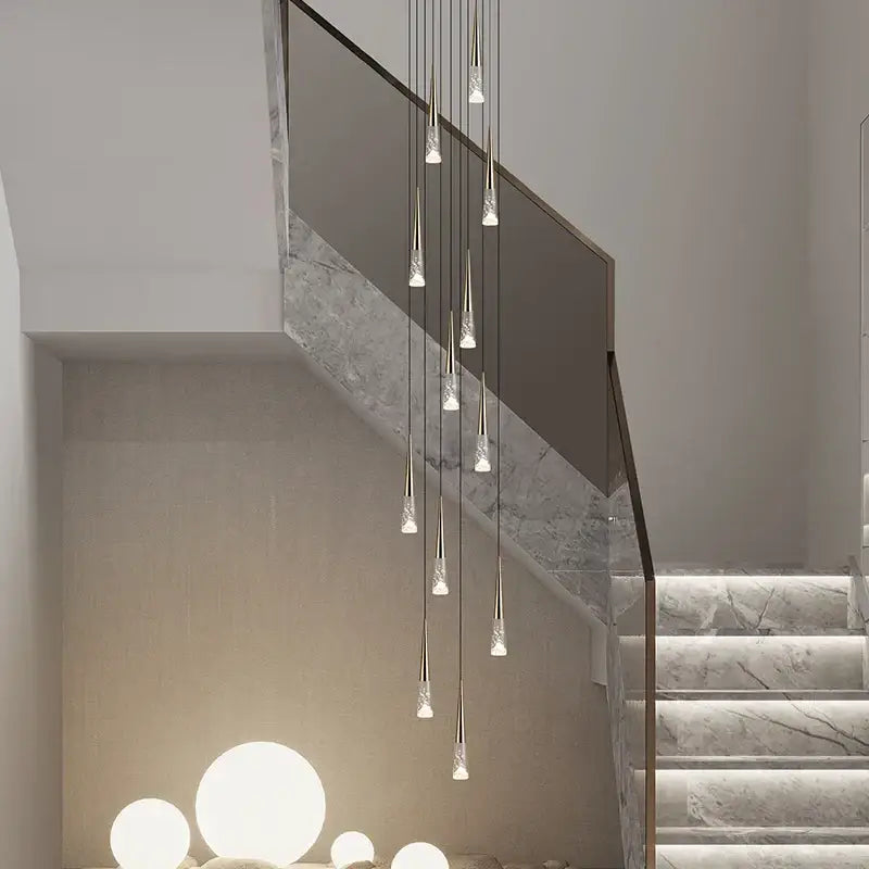 Modern minimalist decorbites led nordic staircase chandelier with slender metallic rods and clear teardrop crystal pendants in golden black
