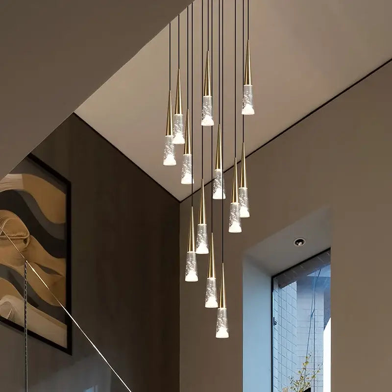 Modern gold-toned decorbites led nordic staircase chandelier with frosted glass shades for indoor lighting use
