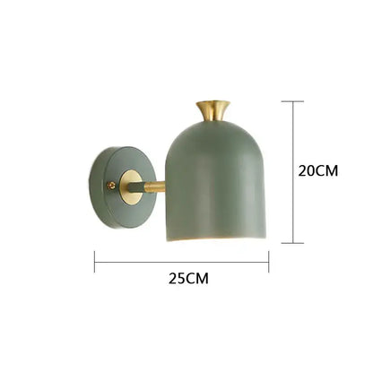 A modern wall lamp with matte sage green bell-shaped shade and brass accents from decorbites led nordic wall series