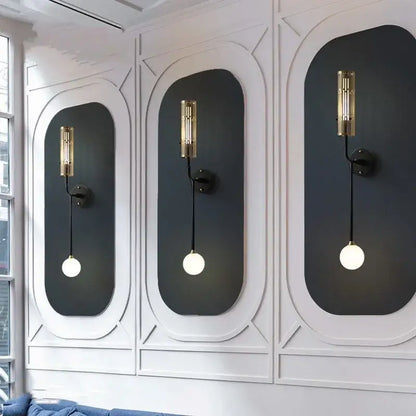 Gold-toned cylindrical decorbites led nordic wall sconce with black cords and white bulbs for luxury living rooms