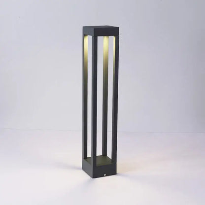 DecorBites™ led outdoor black rectangular pathway light with vertical slats and warm led illumination for lawn lighting