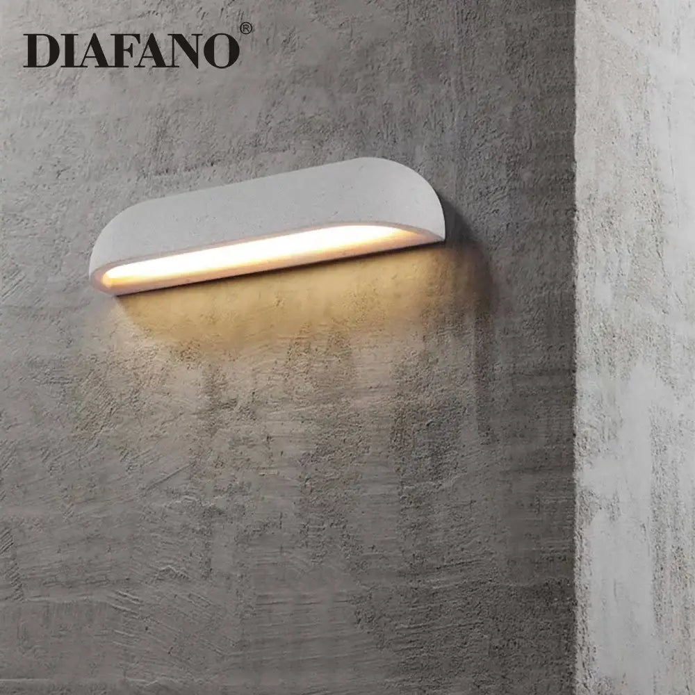 White diafano wall lamp with curved design and warm ambient lighting for decorbites led outdoor wall use