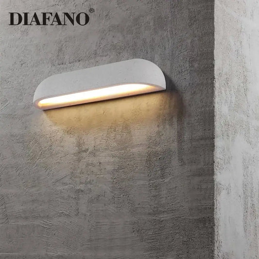 White diafano wall lamp with curved design and warm ambient lighting for decorbites led outdoor wall use