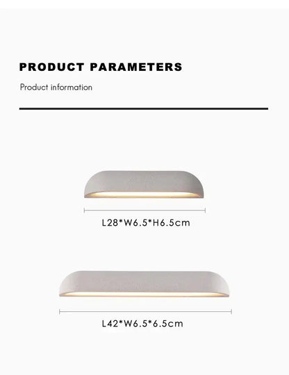 A sleek matte gray decorbites led outdoor wall lamp with curved design for japanese garden stone travertine decoration
