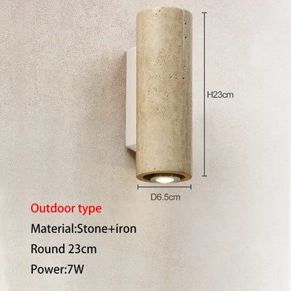 Decorbites led outdoor wall lamp in textured stone and iron with warm base light for garden courtyard lighting