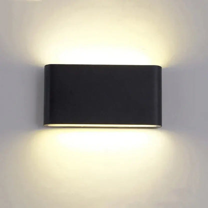 Black rectangular decorbites led outdoor wall light with sleek aluminum design and warm ambient glow IP65 waterproof