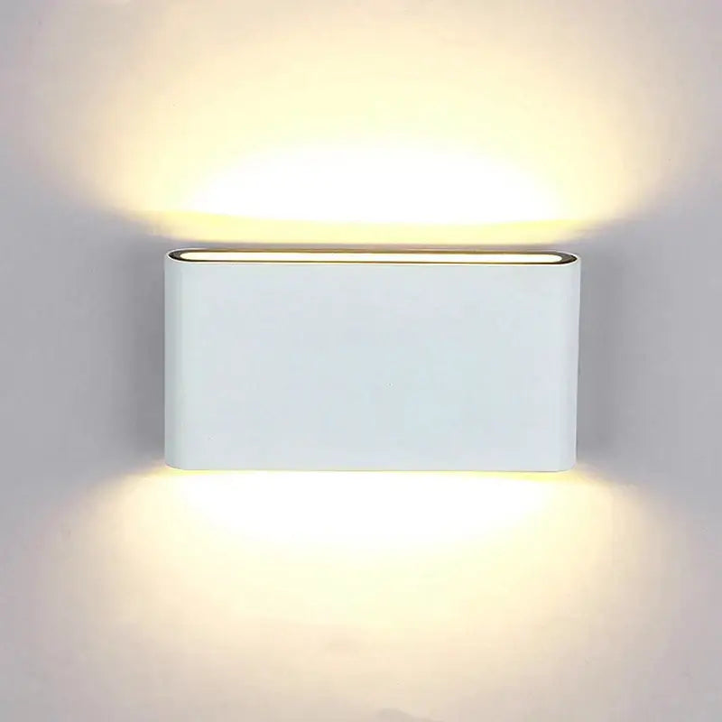 White rectangular decorbites led outdoor wall light with aluminum body and warm ambient glow for outdoor use