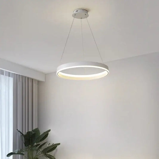 Modern white circular led pendant lamp with sleek minimalist design by decorbites for bedroom kitchen and foyer lighting