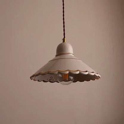White ceramic pendant lamp with scalloped edge gold trim and exposed bulb by DecorBites led pendant lamp