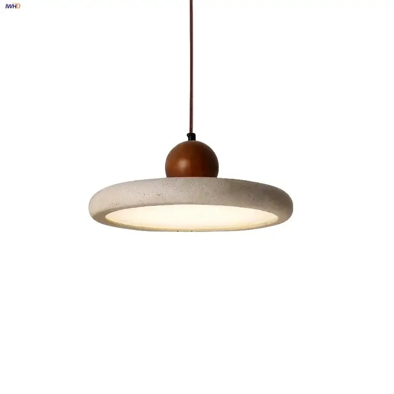 Minimalist decorbites led pendant lamp with a textured yellow stone disc and polished wood globe suspended by brown cord