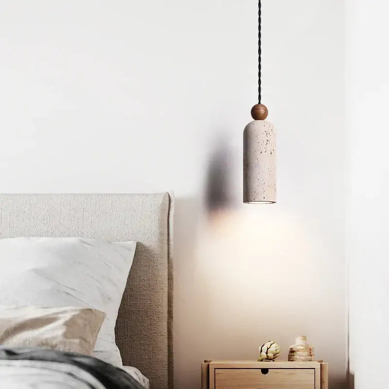 Decorbites led pendant lamp with a yellow travertine wood sphere and off-white concrete body pendant lamp