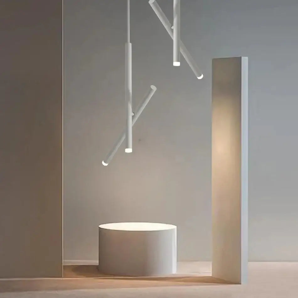 Minimalist white cylindrical DecorBites LED pendant light with sleek modern design for living room ceiling lighting