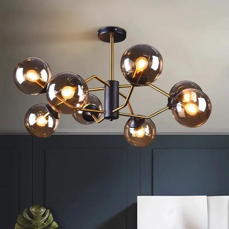 Modern brass and black pendant lights with amber glass globe shades by DecorBites led pendant for dining room lighting