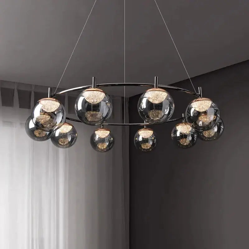 Modern chrome-finished decorbites led pendant light chandelier with spherical glass globes and warm-toned led lights