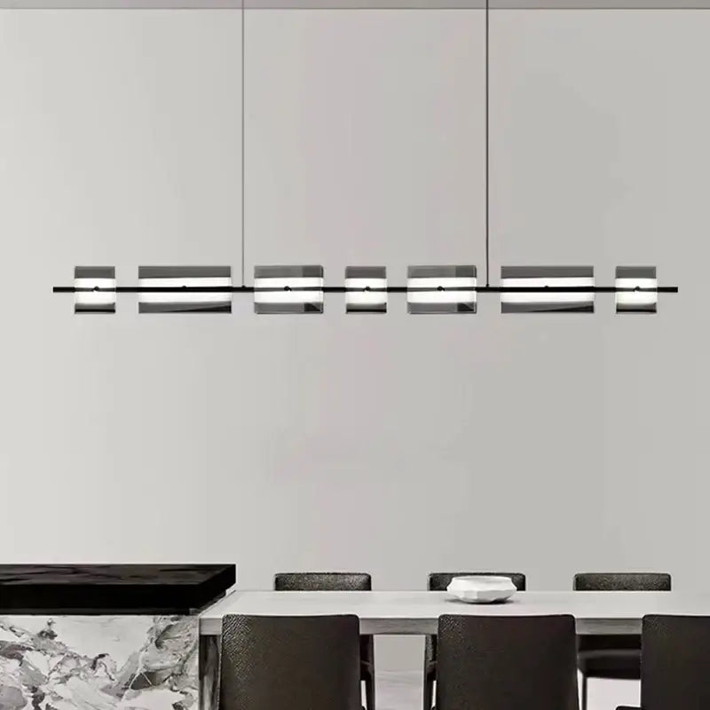 Modern minimalist decorbites led pendant light with black metal frame and frosted glass panels for indoor lighting