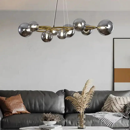 Modern chrome-finished spherical decorbites led pendant light with gold-toned frame for indoor pendant lights