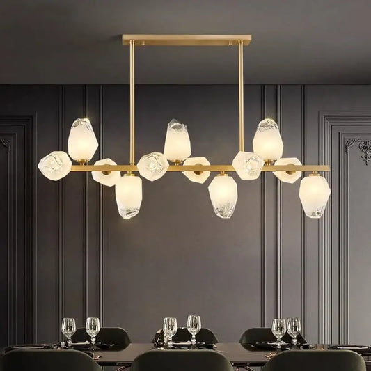 Gold-toned decorbites led pendant light chandelier with faceted translucent glass shades in modern geometric pattern