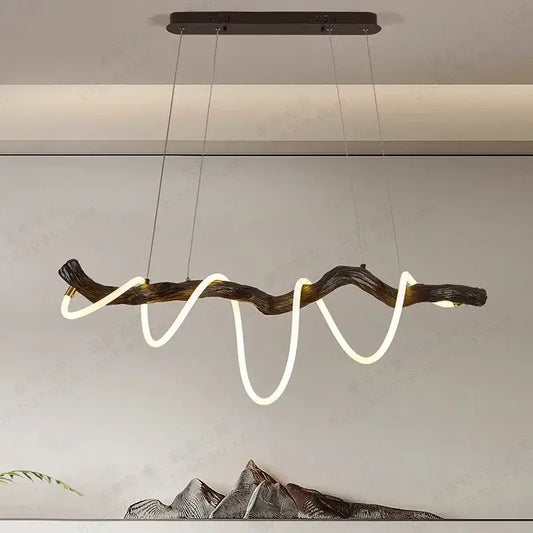 A modern DecorBites led pendant light featuring a dark textured wooden branch with an integrated white led neon strip
