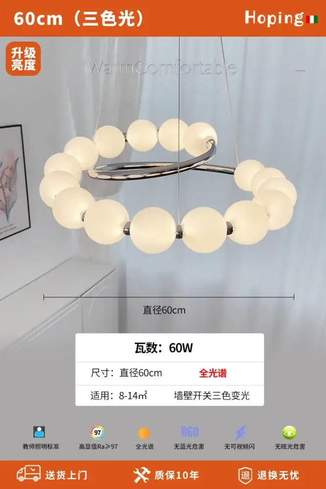 A modern DecorBites pendant light chandelier with frosted white spherical bulbs on chrome metal arms for living room