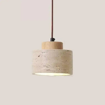 Minimalist decorbites pendant light fixture with textured beige concrete shade and natural wood canopy suspended by fabric cord