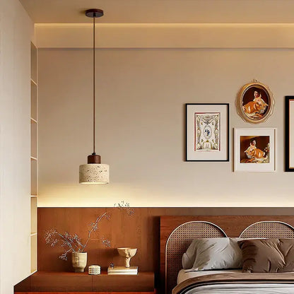 Decorbites™ pendant light fixture with a textured beige travertine shade and dark metal wood canopy for modern lighting