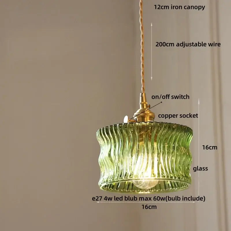 Decorbites led pendant light featuring a green ribbed glass shade with brass accents and a copper socket