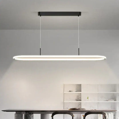 Modern black decorbites led pendant light with sleek oval led fixture suspended by thin cords for dining table lighting