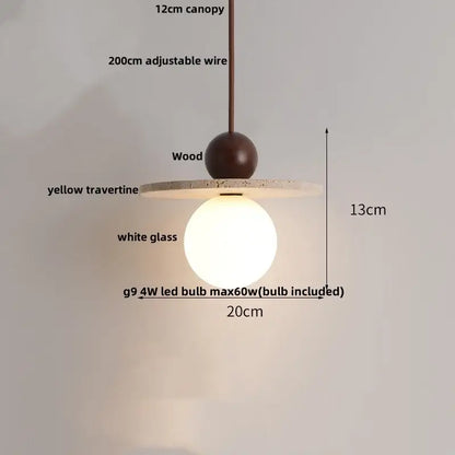 A decorbites led pendant light featuring a dark wood sphere yellow travertine disc and white glass globe