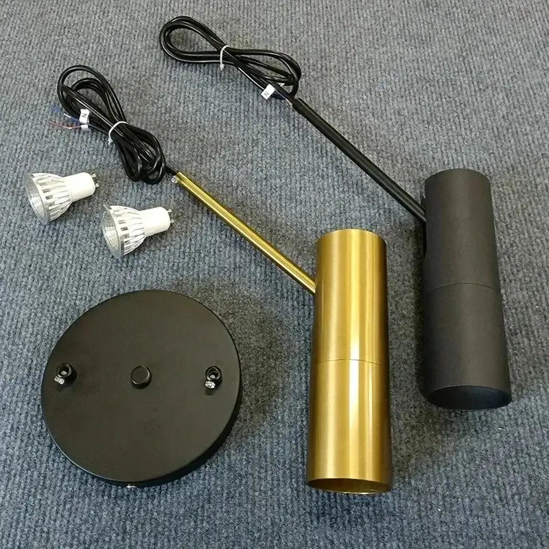 Modern minimalist decorbites led pendant light with gold cylindrical shade and black base for versatile indoor lighting