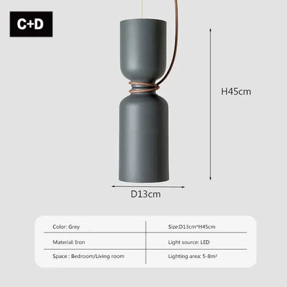 Grey iron DecorBites LED pendant light with sleek two-part cylindrical design and braided cord suspension for modern decor