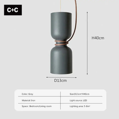 Grey iron pendant light with two cylindrical sections connected by copper wire decorbites led pendant light for modern spaces