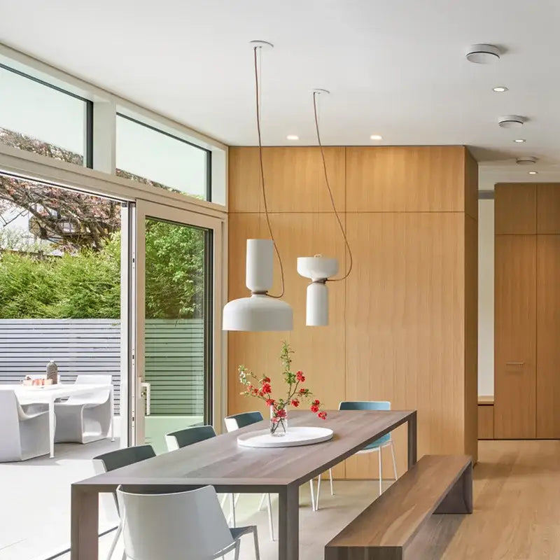 Modern white decorbites led pendant light with sleek cylindrical iron shades for bedroom living room and bars