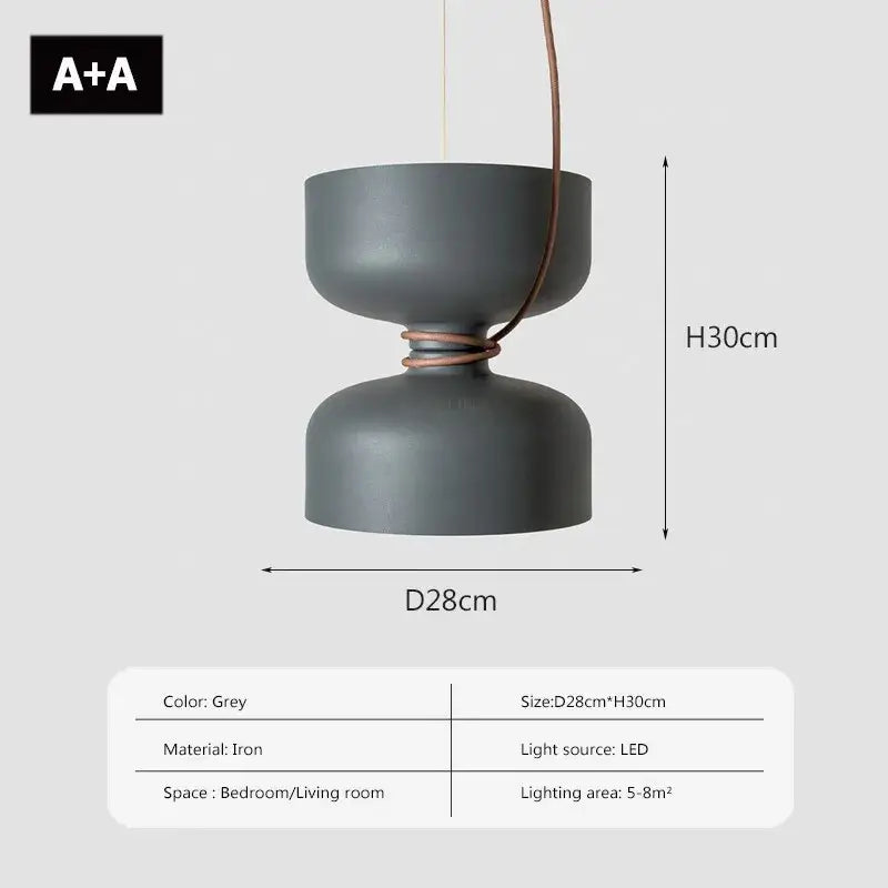 A sleek grey iron DecorBites LED pendant light with a modern asymmetrical design and copper-toned cord for stylish spaces