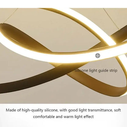 Gold-colored silicone light guide strip with sleek curved design in DecorBites led pendant light for modern decor