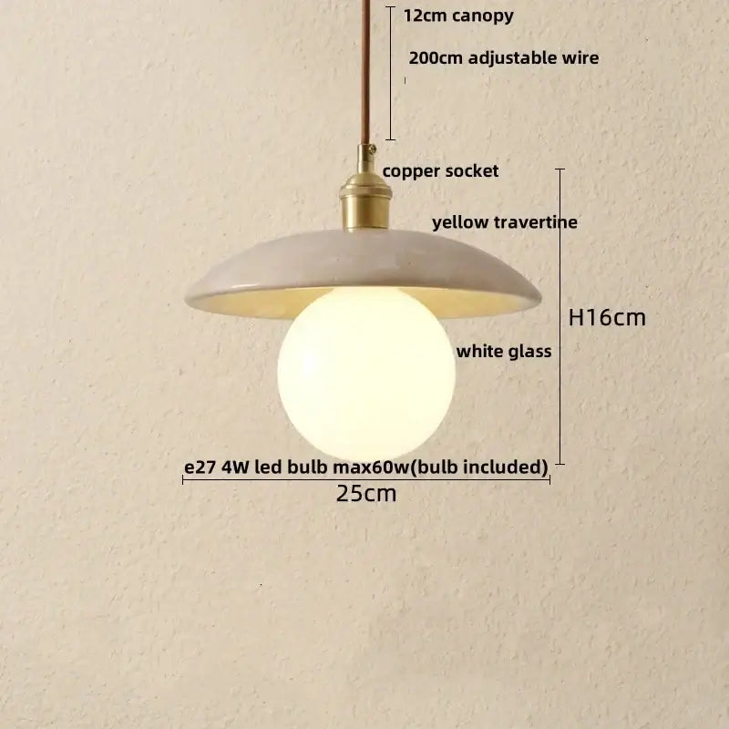 Minimalist DecorBites LED pendant light with matte yellow travertine canopy brass copper socket and glowing white glass globe
