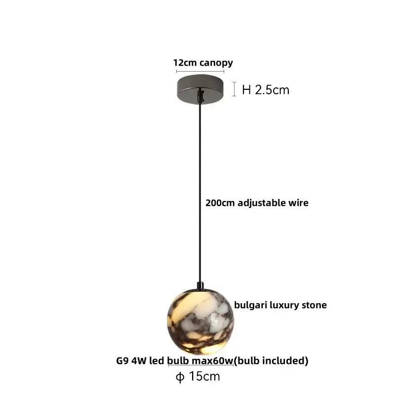 A 15cm decorbites led pendant featuring a polished bulgari stone globe with warm amber and dark gray patterns