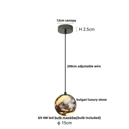 A 15cm decorbites led pendant featuring a polished bulgari stone globe with warm amber and dark gray patterns