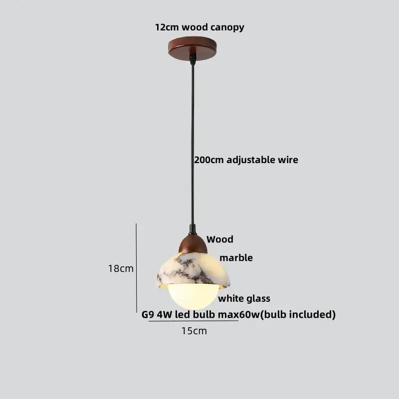 A warm-toned decorbites led pendant light with a 12cm wooden canopy and adjustable wire featuring a wood marble shade