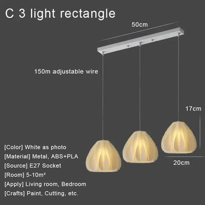 White c3 led pendant lights with three pleated abs pla shades suspended from 50cm metal bar for kitchen decor