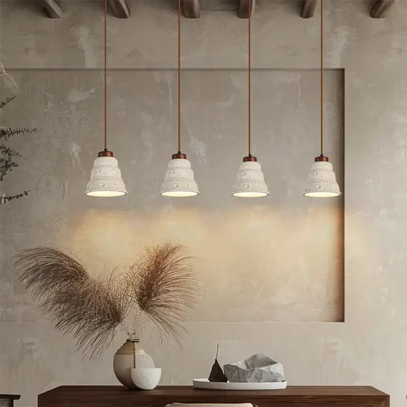 Four white ceramic decorbites led pendant lights with textured shades and copper cords for modern decor lighting