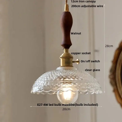 Vintage-style decorbites led pendant light with walnut wood canopy brass hardware and clear patterned glass shade