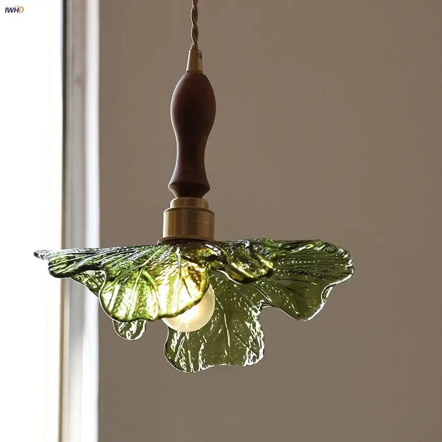 DecorBites led pendant light with green glass leaf design wooden handle and brass accents nordic modern style