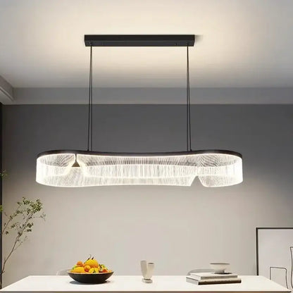 Modern oval pendant lights with black metal frame and clear crystal strands by DecorBites LED pendant lights for indoor use