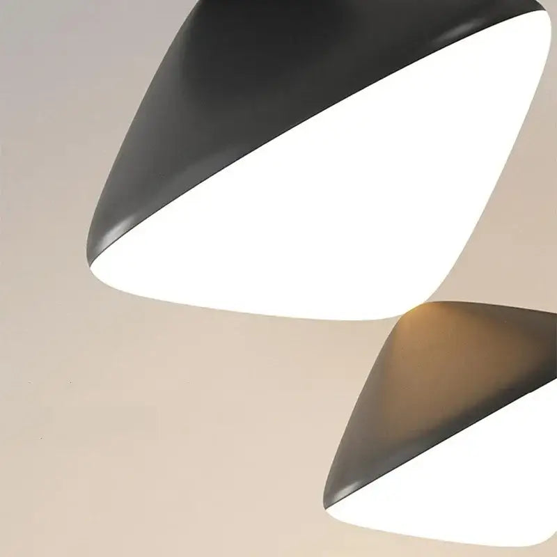 Modern black geometric pendant lights with bright white interiors by DecorBites LED pendant for indoor lighting