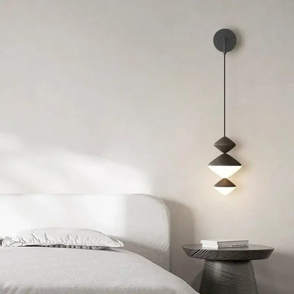 Modern geometric matte dark gray decorbites led pendant lights with stacked triangular shades for indoor lighting