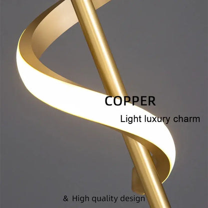 A sleek spiraling copper decorbites led pendant light with warm glow for modern nordic home decor