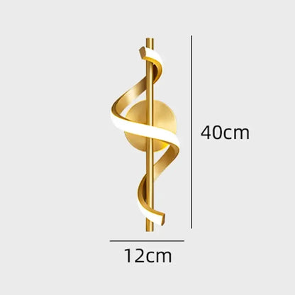 Golden medical symbol sculpture with white ribbon detail featured in decorbites led pendant lights and wall lamps collection