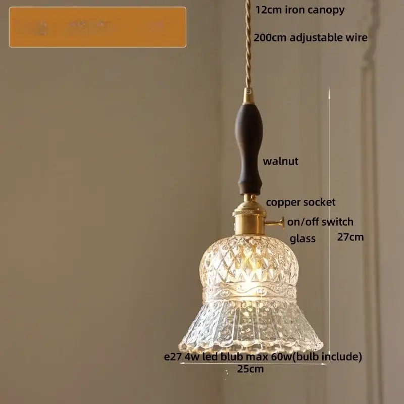 A clear intricately cut glass pendant light with brass copper socket and walnut handle from DecorBites LED pendant lights