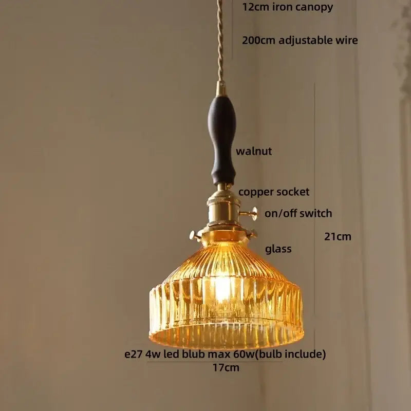 A warm amber glass pendant light with ribbed design and brass copper socket from decorbites led pendant lights collection