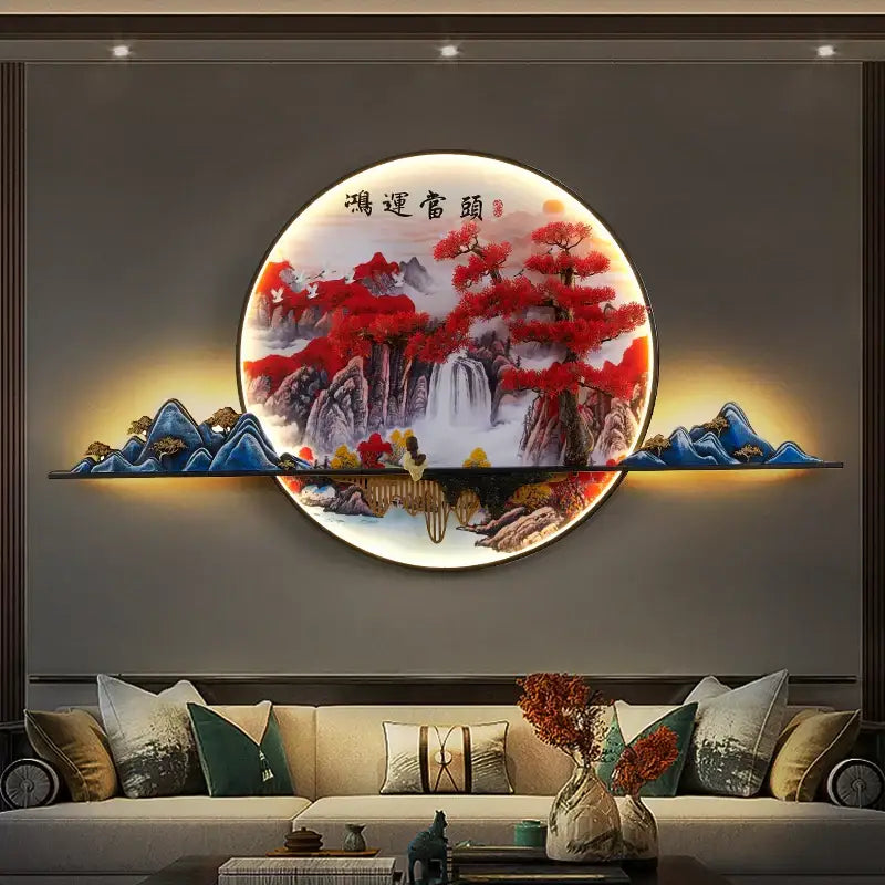 DecorBites™ LED pine landscape wall light with circular illuminated red and blue mountain scene and gold-toned frame
